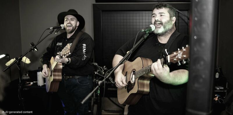 Black and white shot of both brothers singing