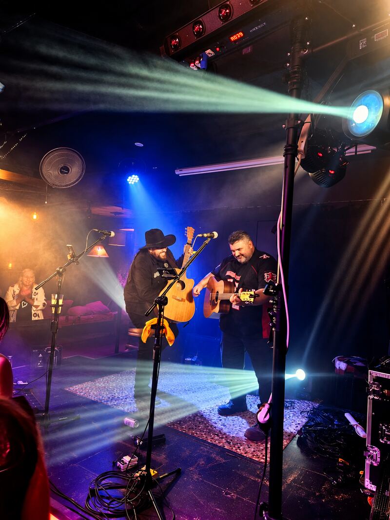 Jesse (in the hat) and Shayne on stage under their new lighting rig